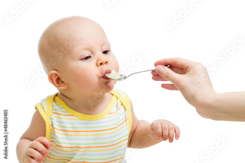 Little baby feeding with a ...