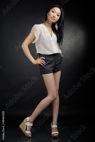 Asian girl in T-shirt and shorts