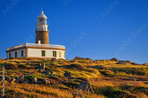 Corrubedo lighthouse at sunset. province of A Coruña, Spain