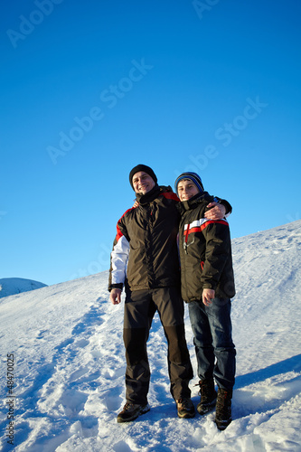Father and son in winter holiday