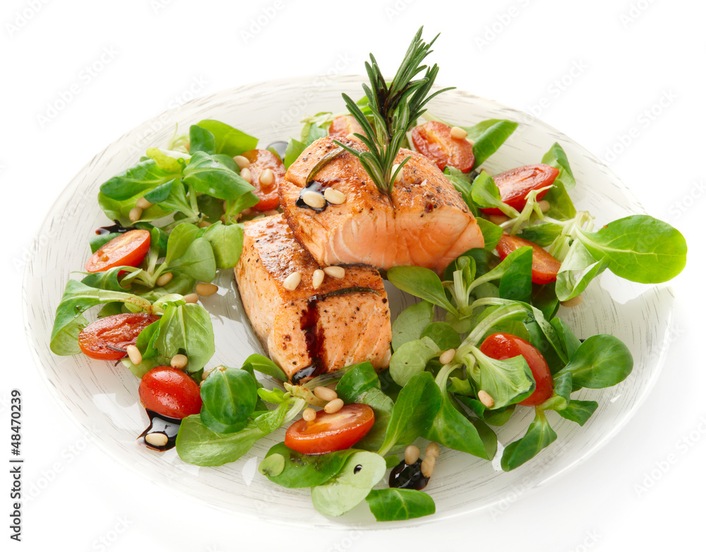 Rare fried salmon steaks isolated on white Rare fried salmon steaks isolated on white