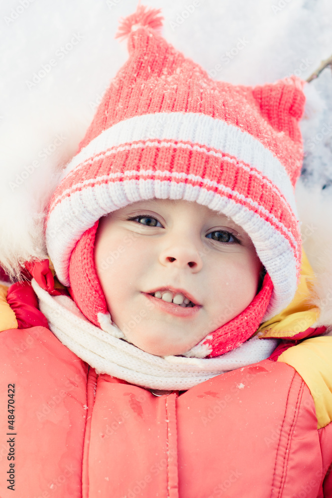 Beautiful happy kid in the red jacket Beautiful happy kid in the red jacket