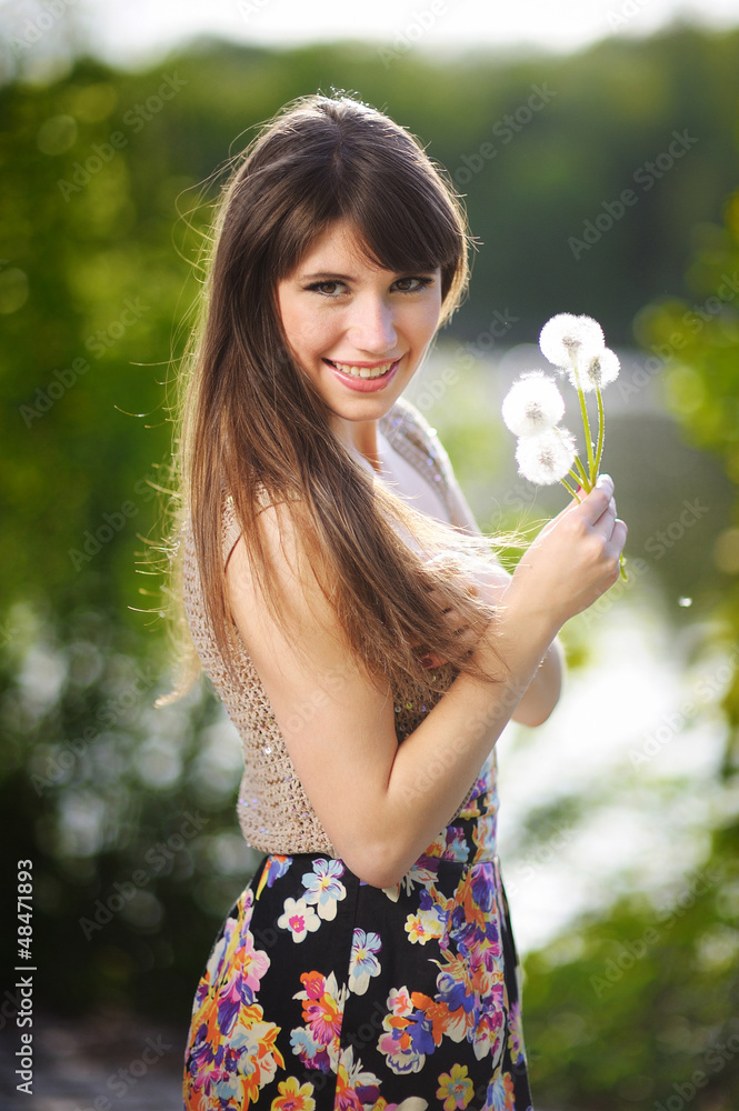 Girl with dandelions