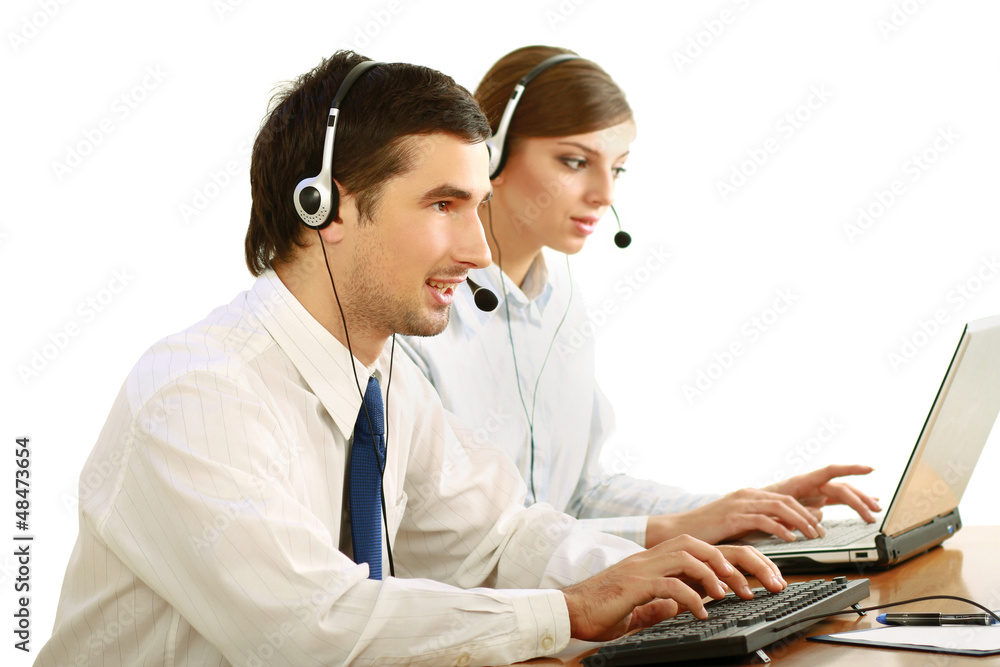 Businesswoman with headset in call center Businesswoman with headset in call center