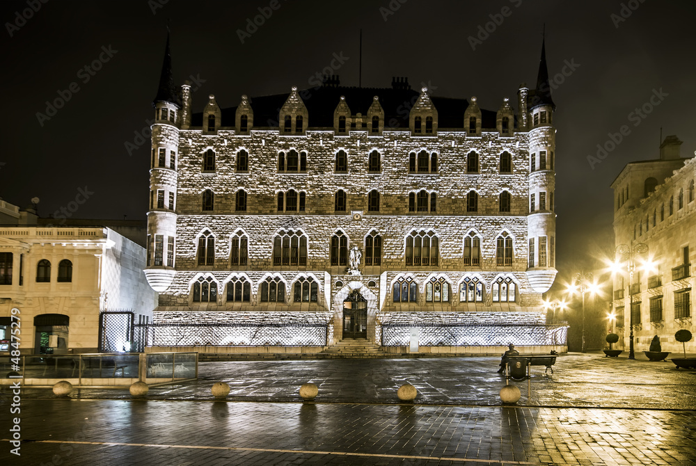 Night shot of the Botines Palace in a foggy day, Leon (Castilla Night shot of the Botines Palace in a foggy day, Leon (Castilla