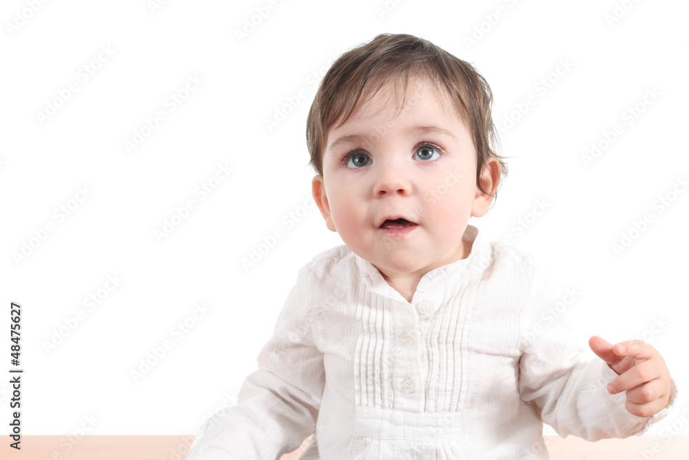 Baby puzzled watching up with a big blue eyes Baby puzzled watching up with a big blue eyes