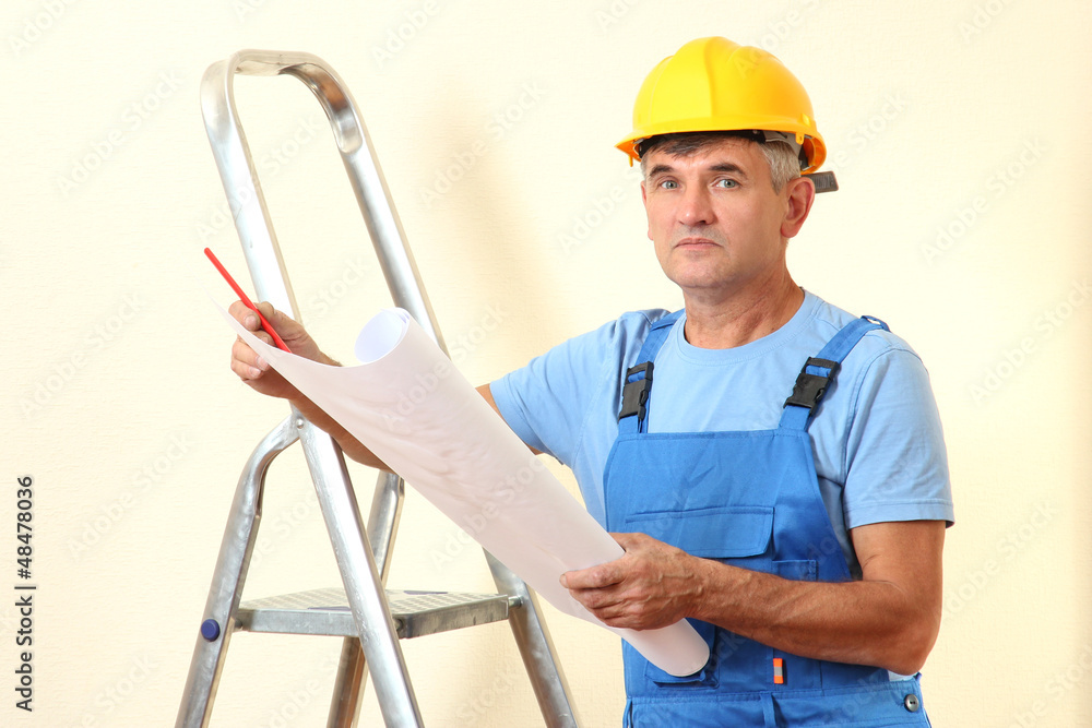 Architect studying construction project Architect studying construction project