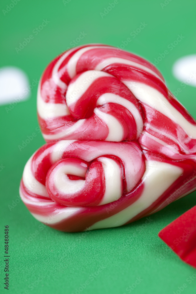 Macro shot of a heart shape candy Macro shot of a heart shape candy