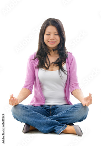 Asian Chinese woman yoga lotus pose