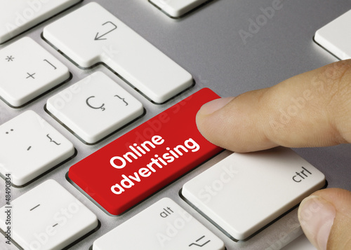 Online advertising keyboard key. Finger