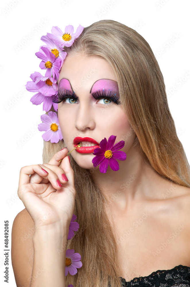 Beautiful young woman with pinkl flowers in hair.Isolated Beautiful young woman with pinkl flowers in hair.Isolated