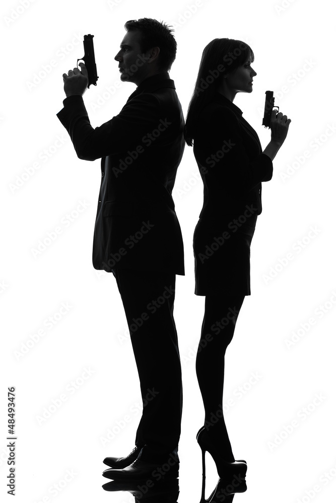 couple woman man detective secret agent criminal silhouette Stock Photo