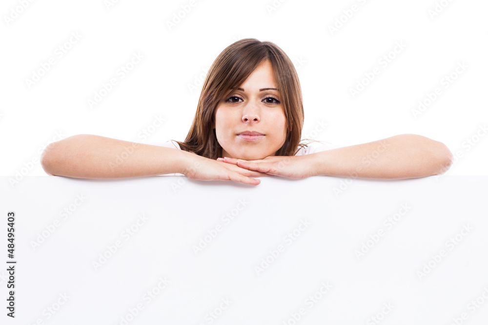 Portrait of a young woman with blank billboard Portrait of a young woman with blank billboard