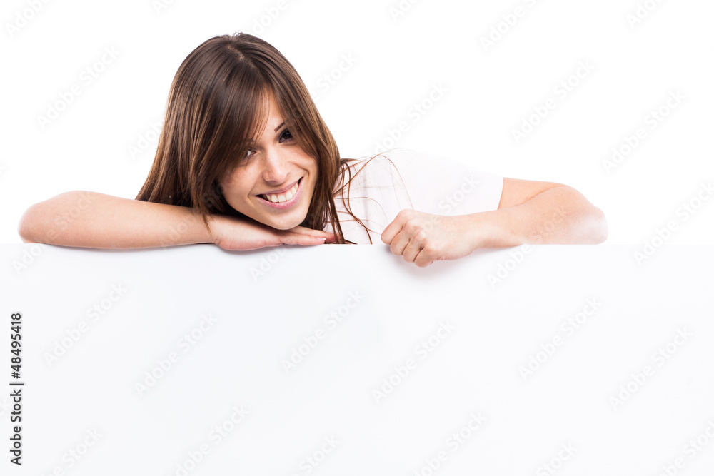Portrait of a young woman with blank billboard Portrait of a young woman with blank billboard