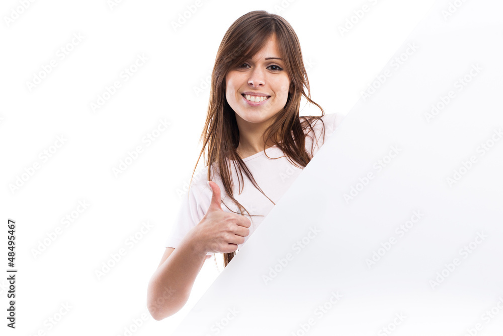 Portrait of a young woman with blank billboard Portrait of a young woman with blank billboard