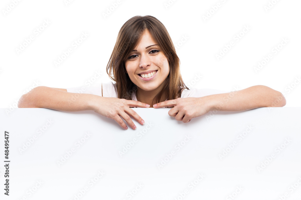 Portrait of a young woman with blank billboard Portrait of a young woman with blank billboard