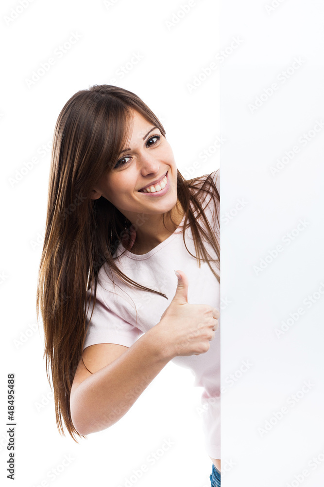 Portrait of a young woman with blank billboard Portrait of a young woman with blank billboard