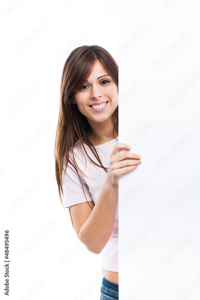 Portrait of a young woman with blank billboard Portrait of a young woman with blank billboard