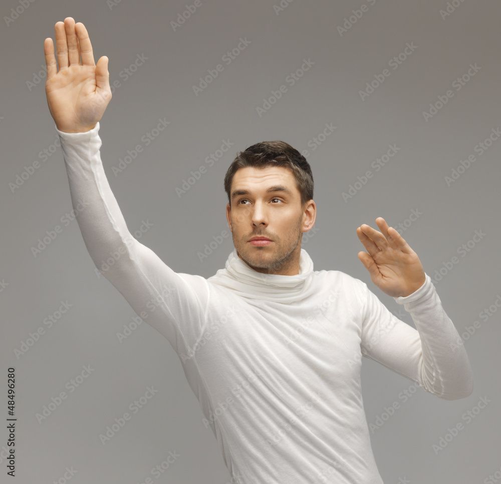 man working with something imaginary man working with something imaginary