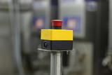 start - stop button on industrial device in plant