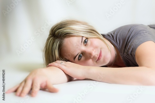 Beautiful woman lying on a bed