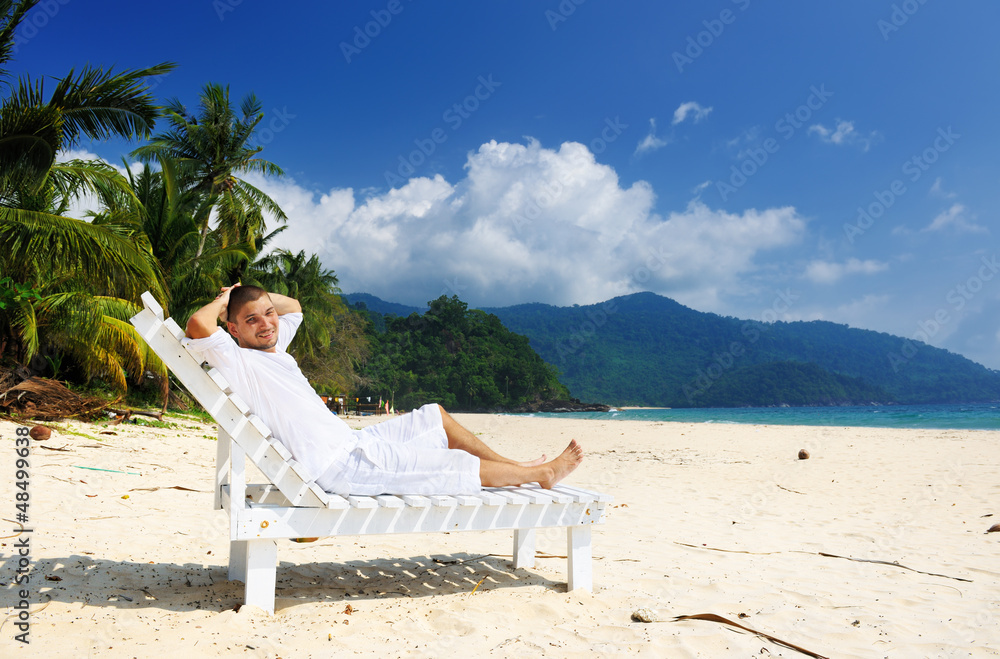 Man relaxing on a beach