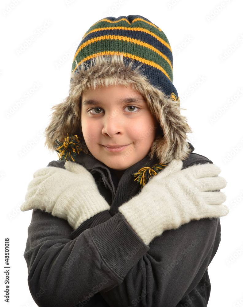 Little child wearing beanie trying to warm up Little child wearing beanie trying to warm up