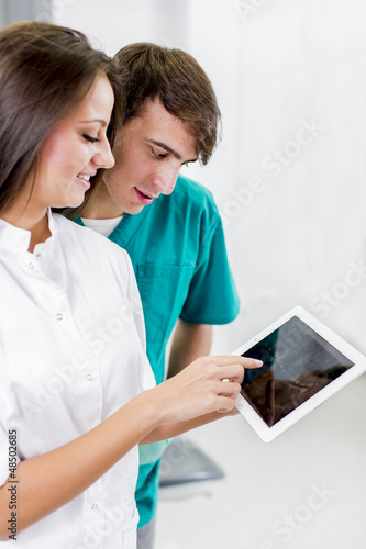 Dentists with tablet