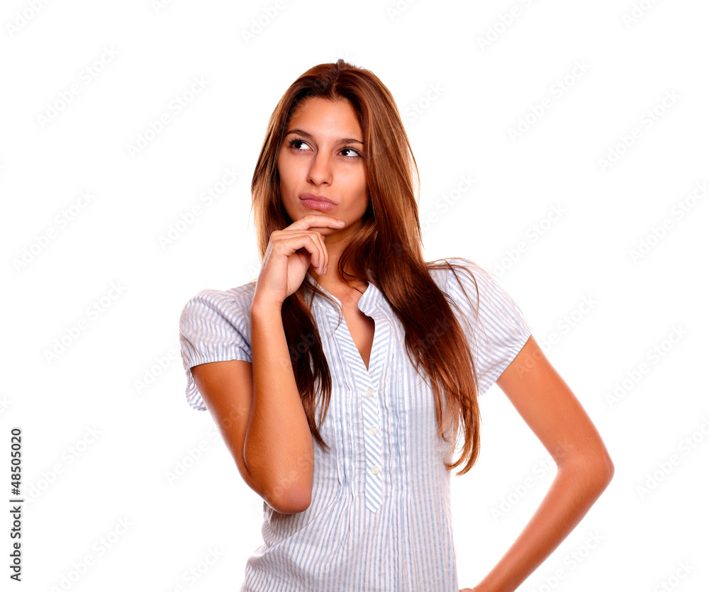 Pensive young woman with long brown hair Pensive young woman with long brown hair