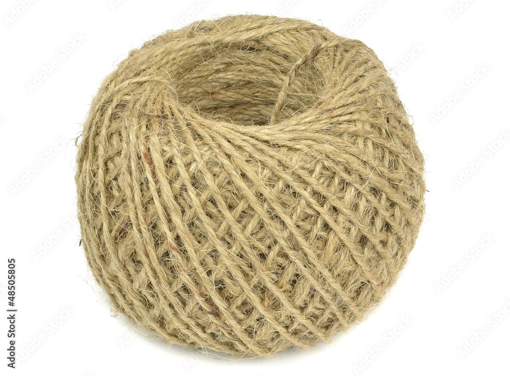 A ball of brown string on a white background A ball of brown string on a white background