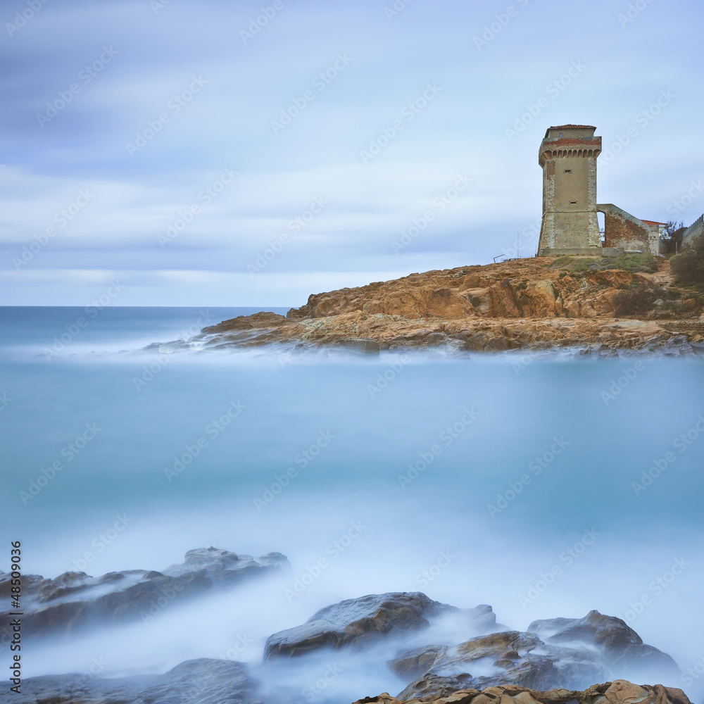 Calafuria Tower landmark on cliff rock and sea. Tuscany, Italy.