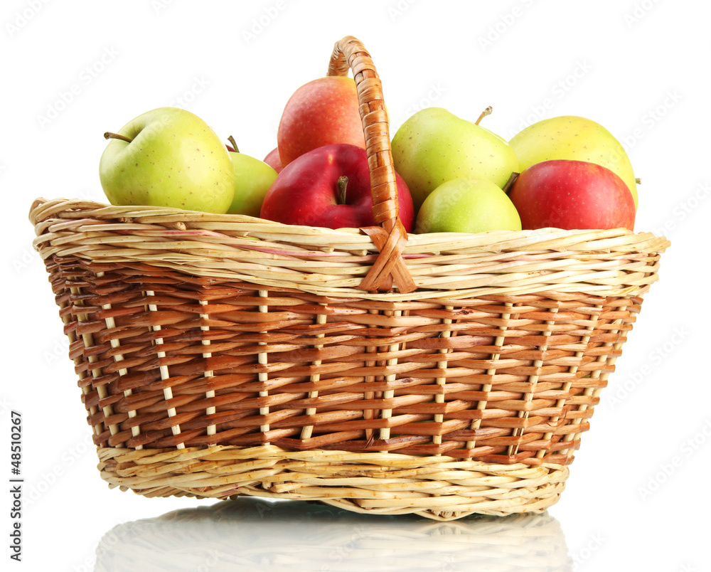 juicy apples in basket, isolated on white