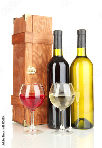 Wooden case with wine bottles isolated on white