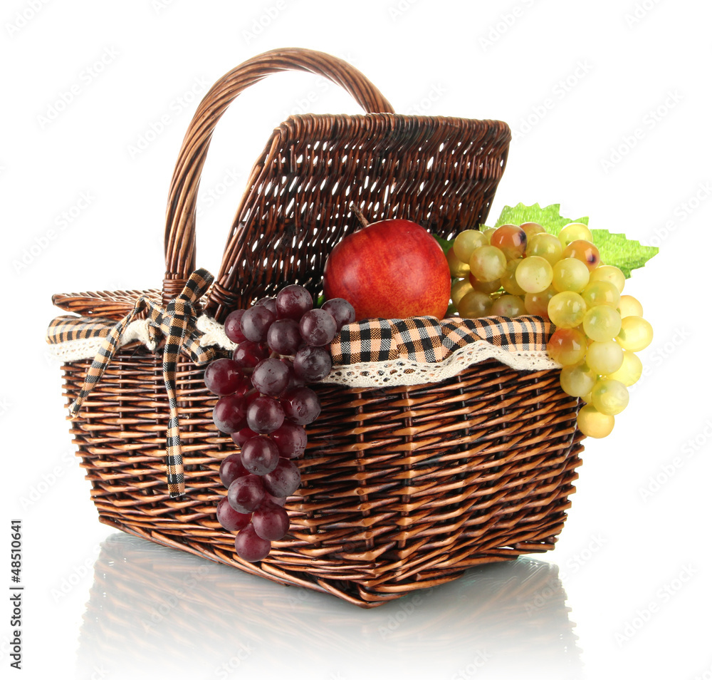 Picnic basket with fruits isolated on white Picnic basket with fruits isolated on white