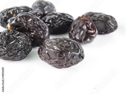 prunes on a white background