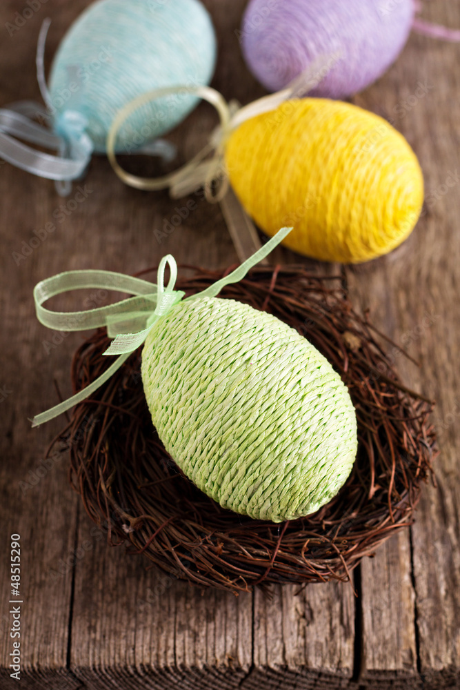 Fototapeta Easter egg in a nest