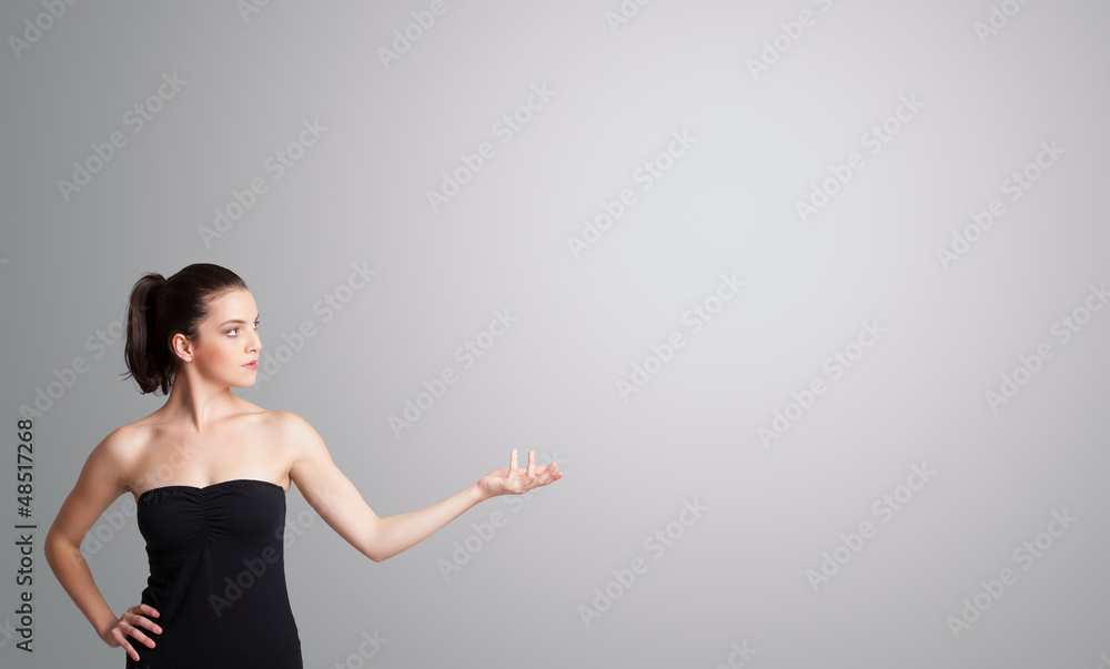 Pretty woman presenting copy space Pretty woman presenting copy space