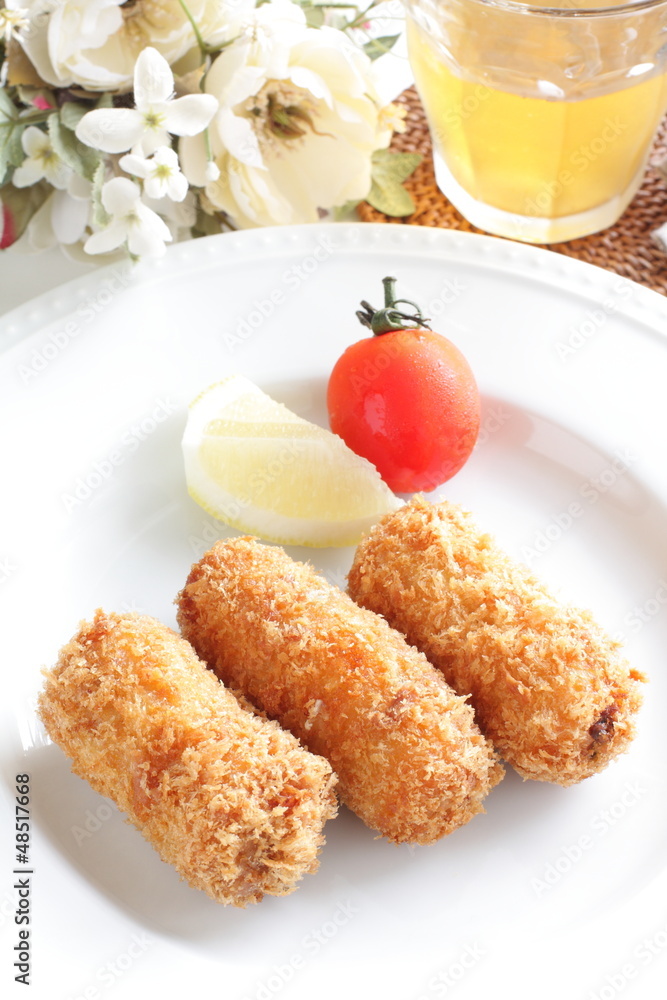 Japanese cuisine, croquette with iced tea Japanese cuisine, croquette with iced tea