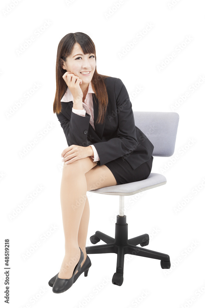 young businesswoman sitting on the chair young businesswoman sitting on the chair