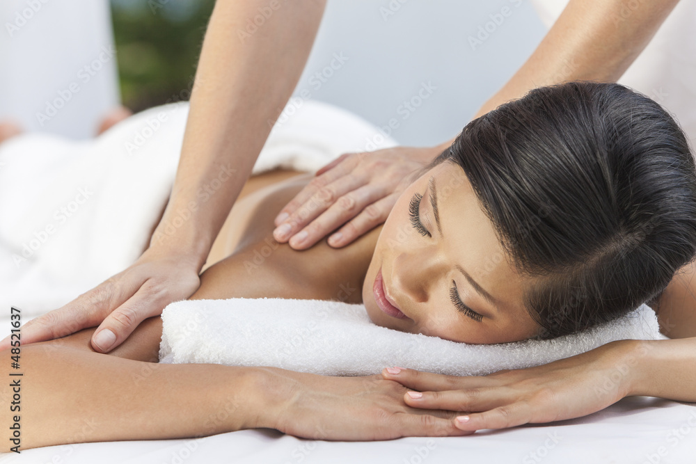 Woman Relaxing At Health Spa Having Massage Woman Relaxing At Health Spa Having Massage