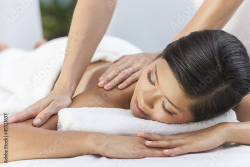 Woman Relaxing At Health Spa Having Massage