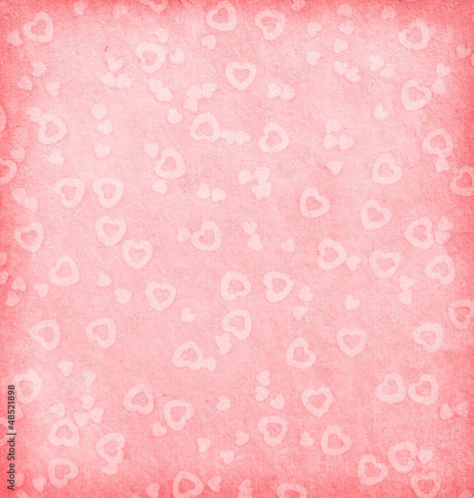 aged paper texture. pink paper with hearts