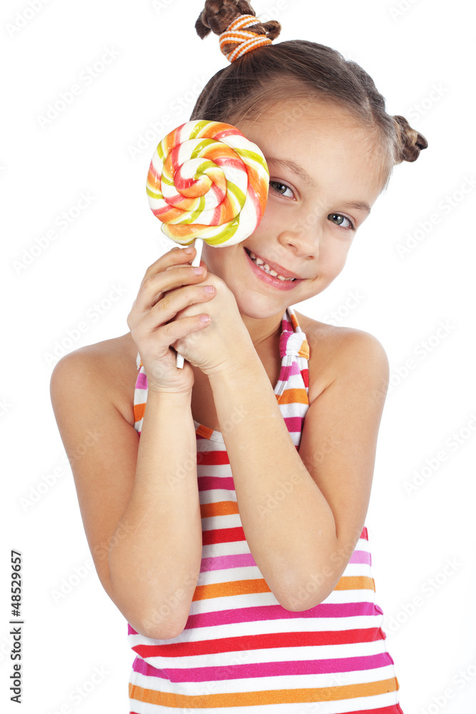 Child holding big lollipop