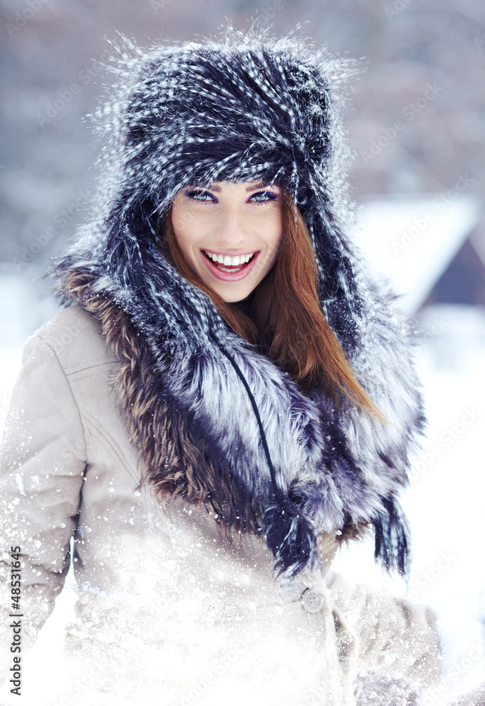 beautiful girl in the park in winter beautiful girl in the park in winter