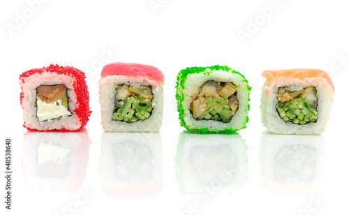 Traditional Japanese food. Different rolls on a white background