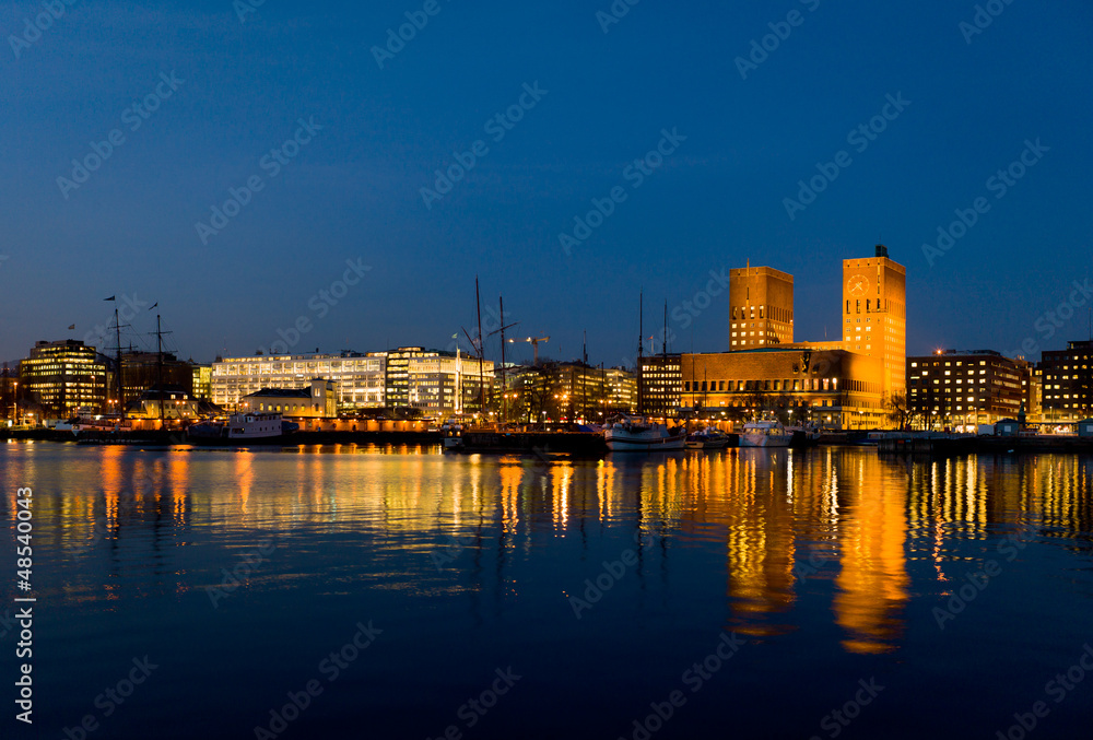 Oslo City Hall and harbour, twilight.