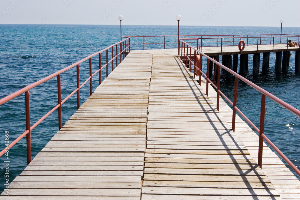 Obraz premium Steg ins Meer