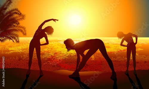 Silhouettes of a woman doing sport exercises on the beach
