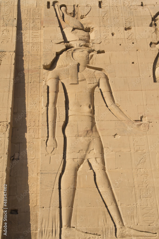 Carving of Egyptian god on pylon (Egypt)
