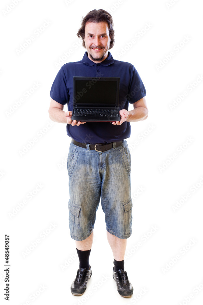 Mid-aged man in blue shirt holding netbook Mid-aged man in blue shirt holding netbook